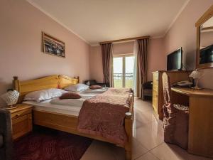 Телевизор и/или развлекательный центр в Hotel Miramare