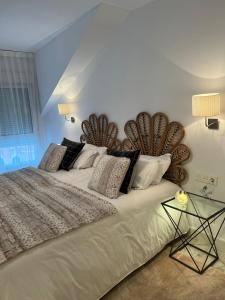 Кровать или кровати в номере Apartamento Platas Centro