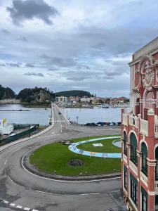 a view of a bridge over a body of water at Apartamento Platas Centro in Ribadesella