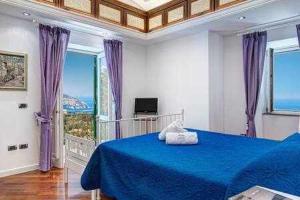 Postel nebo postele na pokoji v ubytování GOCCE VILLAS - The Palace Villa Escondida + 20 fotografií