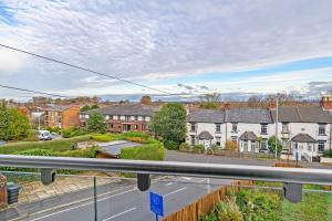 a view from the balcony of a house at Gospel Heights Luxury Apartments With Parking in Heswall