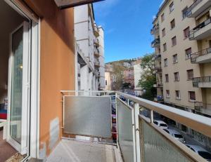 a balcony with a view of a city street at Flat Barbariga 12 in Trieste