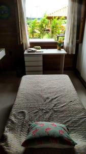 Een bed of bedden in een kamer bij Casa para Alugar para Show Rural Cascavel 2024