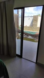 Flor de Cacto Beach Home的阳台或露台