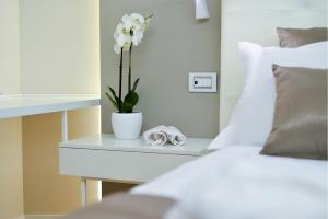 Postel nebo postele na pokoji v ubytování Eleìra Luxury Accomodations