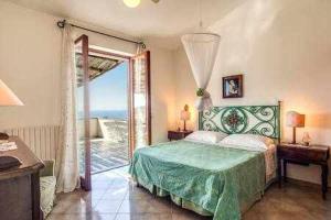 Posteľ alebo postele v izbe v ubytovaní GOCCE VILLAS - Sunshine Villa