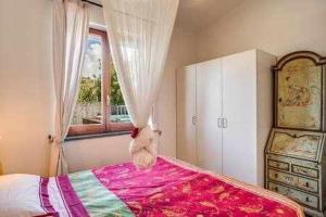 Posteľ alebo postele v izbe v ubytovaní GOCCE VILLAS - Sunshine Villa