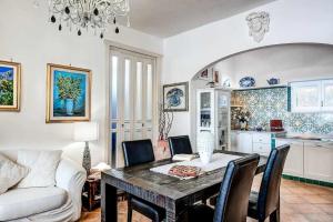 A kitchen or kitchenette at GOCCE VILLAS - Villa Partenope Spectacular Sea View