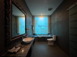 Kopalnica v nastanitvi Tabebuya Resto & Resort