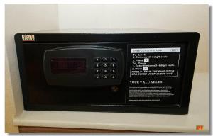a microwave oven sitting on top of a shelf at pristine02 in Manila +34 photos