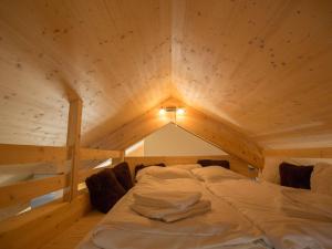 Postel nebo postele na pokoji v ubytování Chalet Klippitztörl 341 by Interhome + 37 fotografií