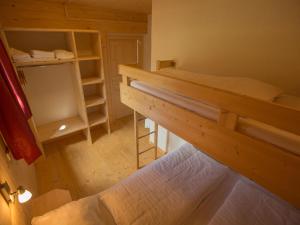 Postel nebo postele na pokoji v ubytování Chalet Klippitztörl 341 by Interhome