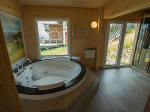 Koupelna v ubytování Chalet Klippitztörl 341 by Interhome