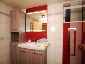 a bathroom with a sink and a mirror at Holiday Home Pfundshof by Interhome in Hippach