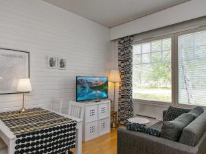 Et tv og/eller underholdning på Holiday Home Moitakuru a8 by Interhome