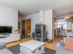 Et tv og/eller underholdning på Holiday Home Moitakuru b 26 by Interhome