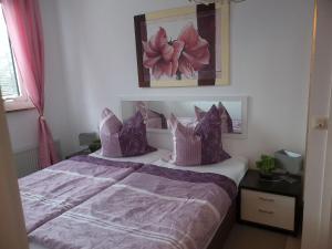 מיטה או מיטות בחדר ב-Apartment Amina by Interhome