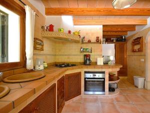 A kitchen or kitchenette at Holiday Home Roura by Interhome