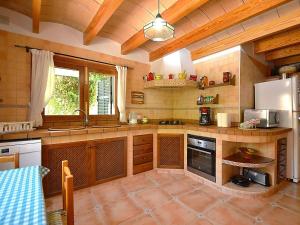 A kitchen or kitchenette at Holiday Home Roura by Interhome