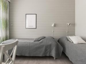 Krevet ili kreveti u jedinici u okviru objekta Holiday Home Rautulampi h 23 by Interhome