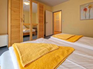 Postel nebo postele na pokoji v ubytování Störtebeker Residenz