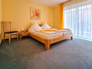 Postel nebo postele na pokoji v ubytování Störtebeker Residenz