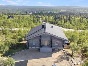 an overhead view of a log cabin in the woods at Holiday Home Uuvana by Interhome in Saariselka