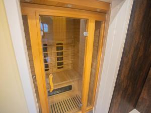 a glass door with a banana in a room at Chalet Cobbs by Interhome in Drumnadrochit