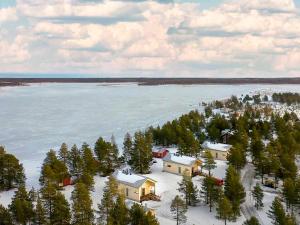 an aerial view of a house on the shore of a lake at Holiday Home Taimen by Interhome in Hailuoto