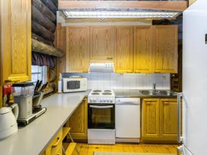 Kuchyň nebo kuchyňský kout v ubytování Holiday Home Kultarinne by Interhome + 21 fotografií