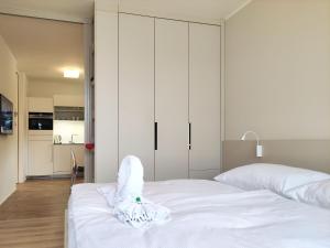 Postel nebo postele na pokoji v ubytování Tichý Apartmán u Mumlavského vodopádu 2KK s garáží v těsné blízkosti Hornického muzea - by Relax Harrachov