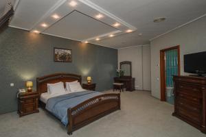 Кровать или кровати в номере Cherkasy Palace
