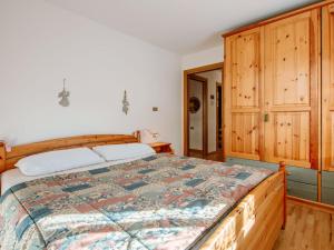 Ένα ή περισσότερα κρεβάτια σε δωμάτιο στο Apartment Casa Bucci by Interhome