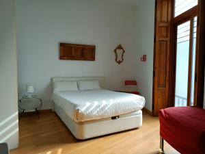 Ένα ή περισσότερα κρεβάτια σε δωμάτιο στο Tossal