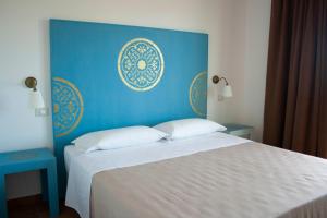 Krevet ili kreveti u jedinici u okviru objekta Zeta Resort Donnalucata