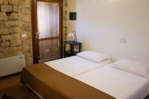 Krevet ili kreveti u jedinici u okviru objekta Zeta Resort Donnalucata