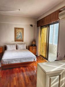 Postel nebo postele na pokoji v ubytování Home House Rethymno