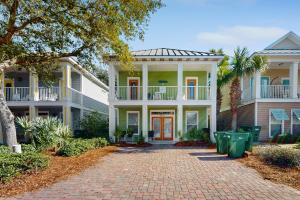 a house with a brick driveway in front of it at Villages of Crystal Beach: Serenity in Destin