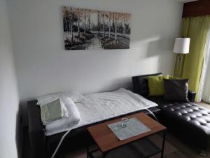 Postel nebo postele na pokoji v ubytování Suite Panoramablick Seefeld
