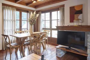 A television and/or entertainment centre at Val de Ruda Luxe 67 by FeelFree Rentals