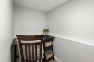a chair sitting at a desk in a room at Mountain Retreat in North Saanich
