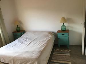 Postel nebo postele na pokoji v ubytování Casa de montaña, Las Chacritas