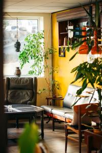 Uma área de estar em Hildibrand Apartment Hotel
