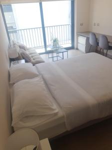 Postelja oz. postelje v sobi nastanitve Central Vip Antofagasta