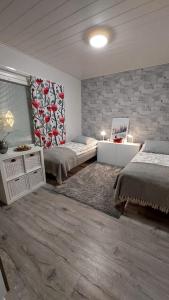 Posezení v ubytování Nordic Style Home, 2 bedroom