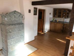 Kuchyň nebo kuchyňský kout v ubytování Chaloupka u Jiřího