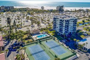 an aerial view of the tennis courts at the resort at Our House At The Beach, East Tower, 5th Fl in Siesta Key
