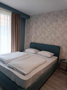 Postel nebo postele na pokoji v ubytování new Gudauri 214