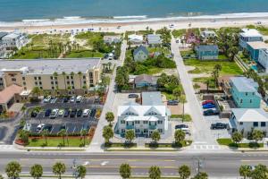 an aerial view of a town with the beach at Oceans 13 Condo C in Saint Augustine Beach