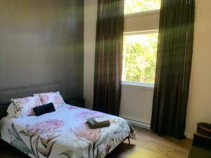Ένα ή περισσότερα κρεβάτια σε δωμάτιο στο Chalet des Grands-Ducs